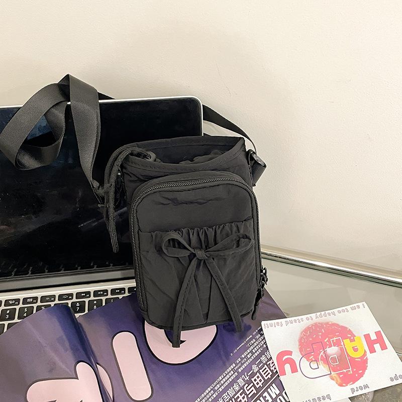

Outdoor lightweight bow bundle messenger bag waterproof mobile phone bag thermal insulation kettle bag women s shoulder bag чорний