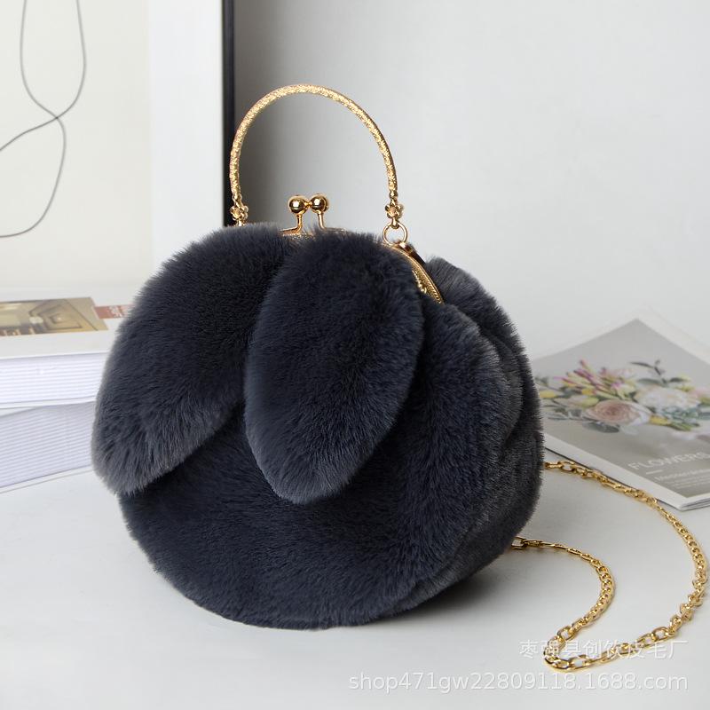 Plush rabbit bag female oblique cross Korean version cute portable fluffy bag autumn and winter new rabbit ear clip bag clip bag