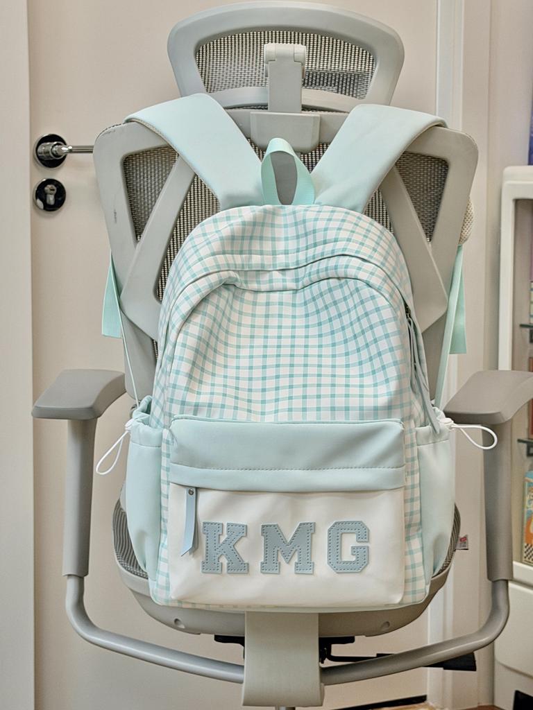 Schoolbag plaid backpack female student schoolbag Korean version large capacity lightweight backpack cute cartoon pain bag new campus bag