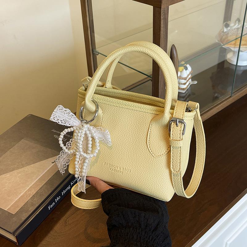 

Simple foreign style portable small bag women s 2025 summer new bucket bag fashionable versatile texture women s messenger bag single bag жёлтый