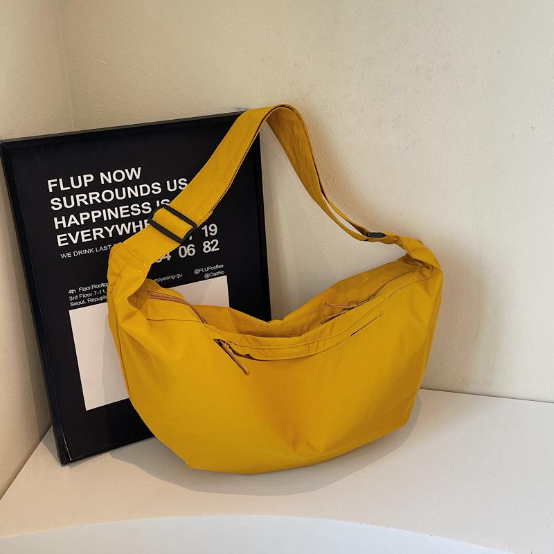 

2025 women s bag Korean version ins canvas dumpling bag fashion casual messenger bag simple breast bag trendy bag жёлтый