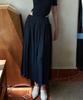Eine Cut-Off Pleated Skirt (Beige)