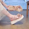 Two-color flower platform slippers female 2025 summer new Korean version fairy wind flat bottom student fashion beach cool slippers