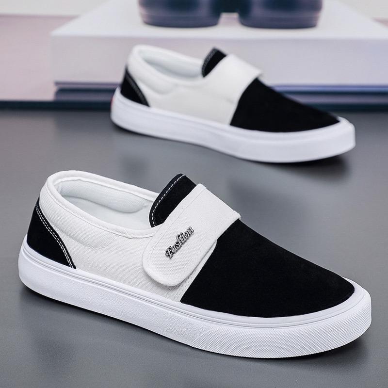 Fashion breathable versatile black and white color matching one-pedal Velcro low-top men's shoes student canvas board shoes