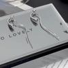 French Minimalist Silver Teardrop Tassel Earrings - Stylish & Versatile Design