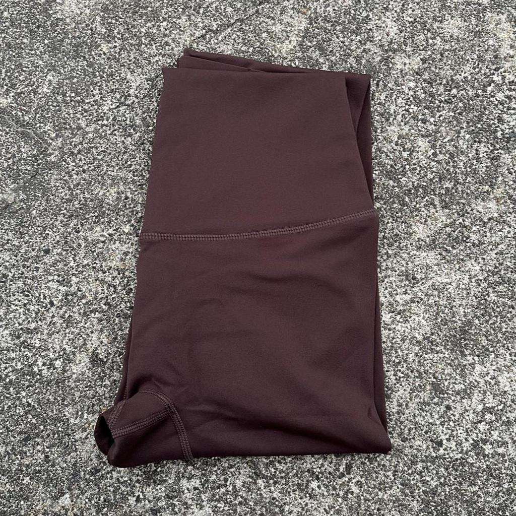 Solid Color High-Waisted Women's Yoga Leggings with Back Pocket – Soft, Elastic, and Peach Bum Enhancing