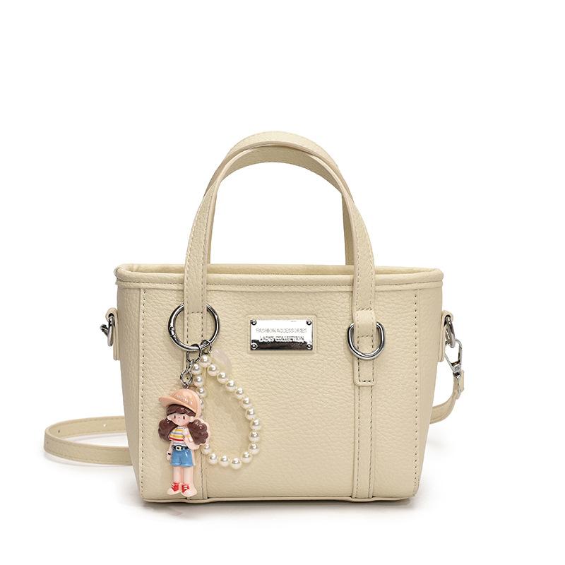 Spring hot sale lychee pattern high-end portable bucket bag Korean version casual small fresh temperament versatile messenger women's bag