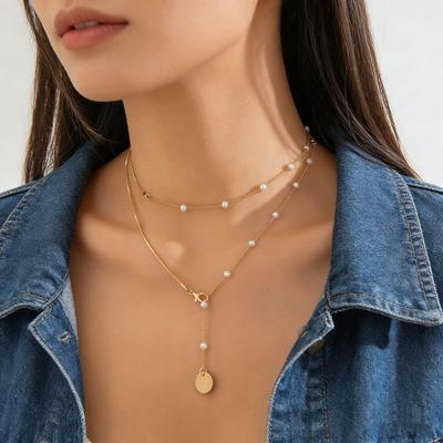 Elegant Double-Layer Snake Bone Chain Necklace with Faux Pearl Tassel