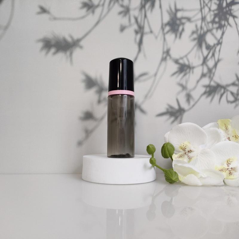 Available 60ml Transparent Black Foam Mousse Bottle for Face Wash and Travel-friendly Cosmetic Packaging.
