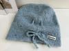Curling lazy wind outdoor drawstring stacking hat knitted wool pullover hat neat solid color ear protection cold hat bag head