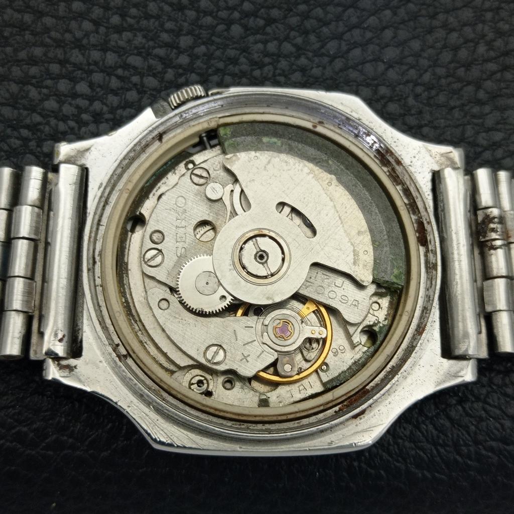 GENUINE VINTAGE SEIKO 5 AUTOMATIC 7009A JAPAN MENS BLACK DIAL WATCH A702397-5 R124-a702397