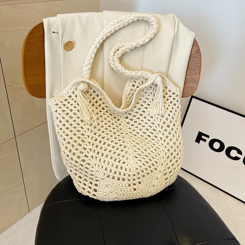 Hollow knitted bag women's large-capacity new summer shoulder knitted bag seaside vacation beach bag