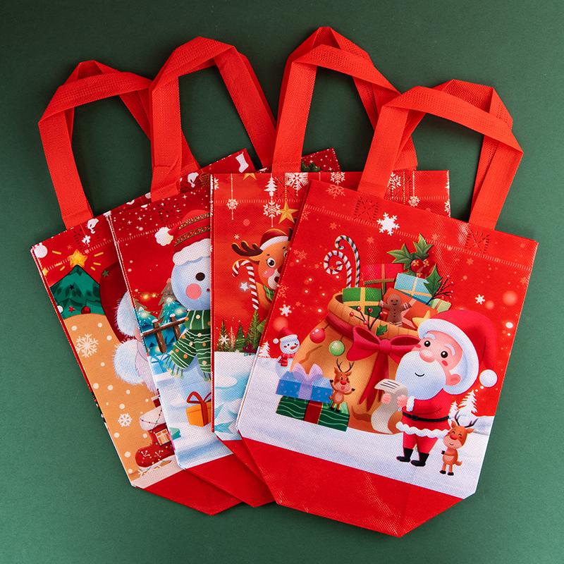 12/30pcs Christmas non woven tote bags reusable gift bags with reindeer print for kids candy cookies and treats party supplies