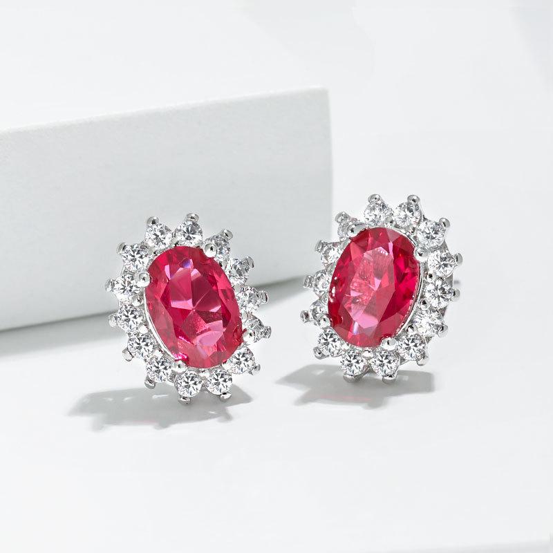 Zodiac Stone Gemstone Stud Earrings: Exaggerated Royal Blue Sapphire Sunflower Design in European and American Style.