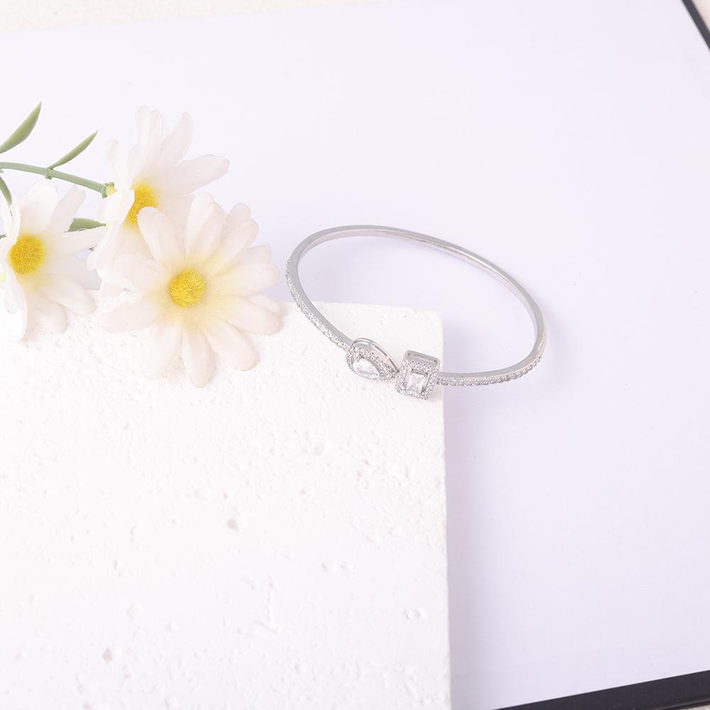 18K Gold-Plated Zirconia Bangle Bracelet with Adjustable Open Design for Women - Available In Gold and Silver.