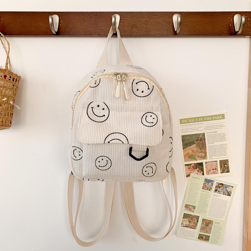 Mini backpack cute smiley face versatile small cosmetic bag corduroy student schoolbag