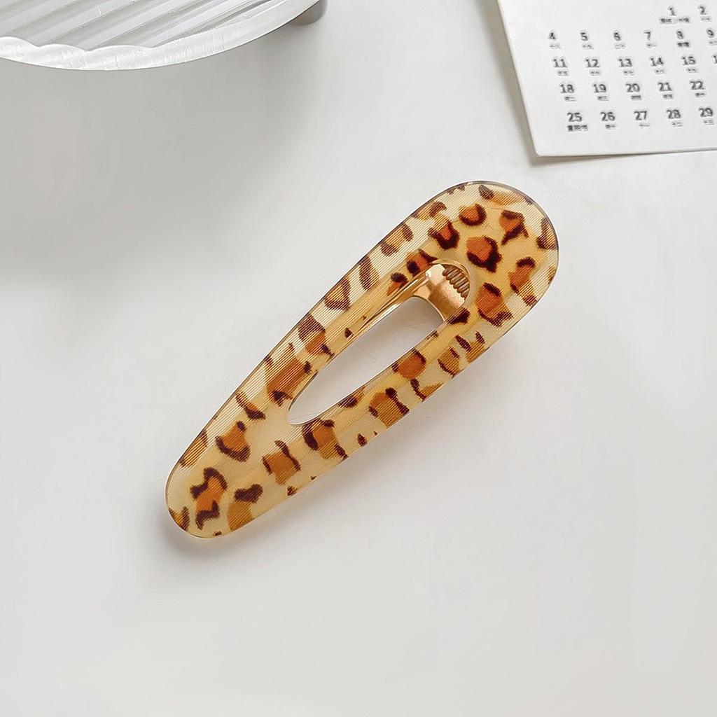 Barrette à cheveux en acrylique imprimé léopard: Barrette à frange rétro haut de gamme pour femmes