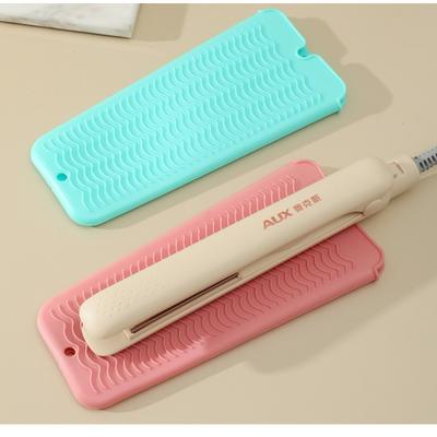 Accessori per la messa in piega – Supporti per ferri e piastre per capelli