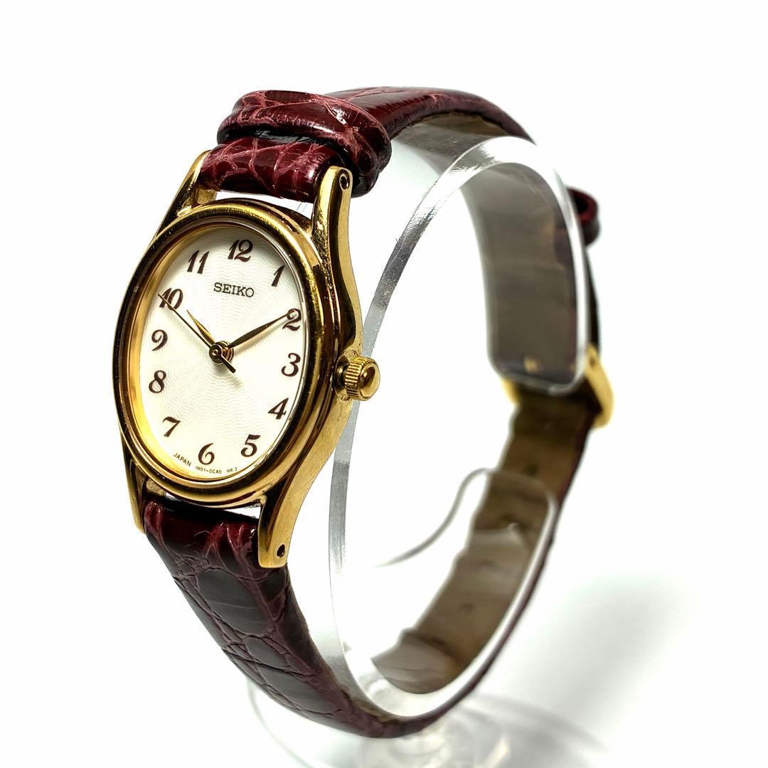 In working condition, in good condition, SEIKO wristwatch, quartz, red leather strap