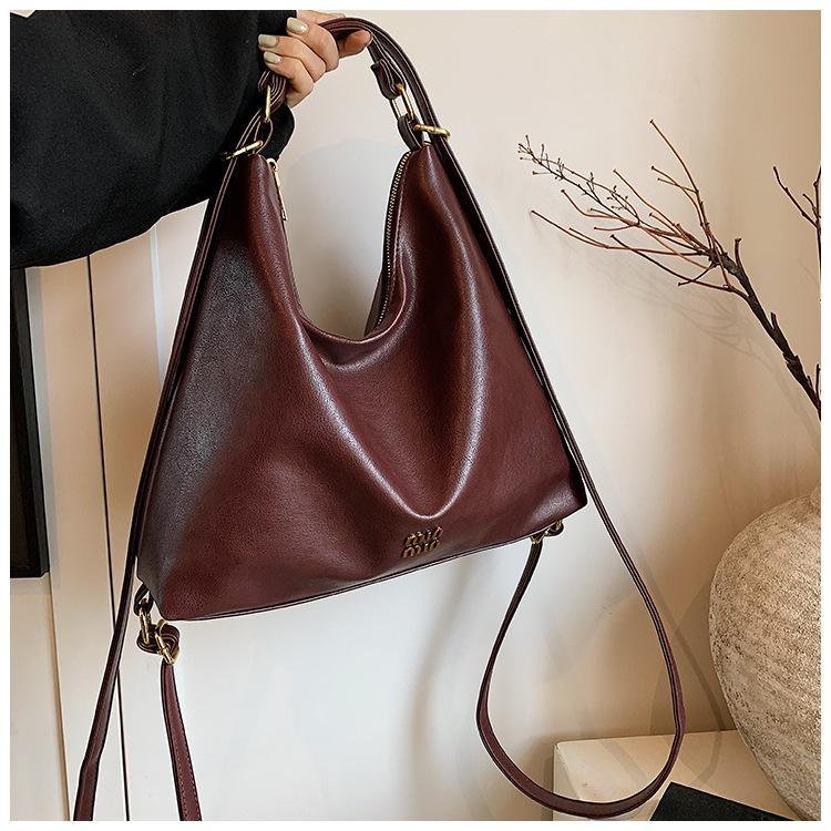 

Leisure commuter tote bag women s large capacity 2024 new street trend backpack niche travel backpack бордовий