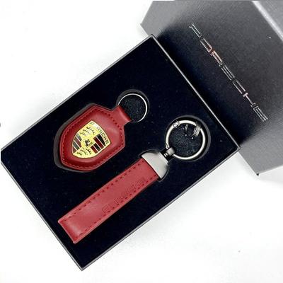 Porte-clés de voiture Bouclier Porte-clés en cuir Chaîne Pendentif Cadeaux Pour Porsche Macan 911 718 Taycan Panamera Cayenne Boxster Cayman