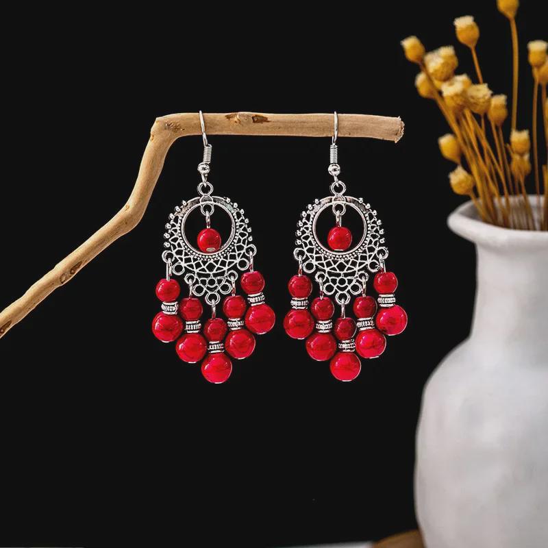 Boucles d'oreilles bohèmes à pompons turquoise bleu pour femmes