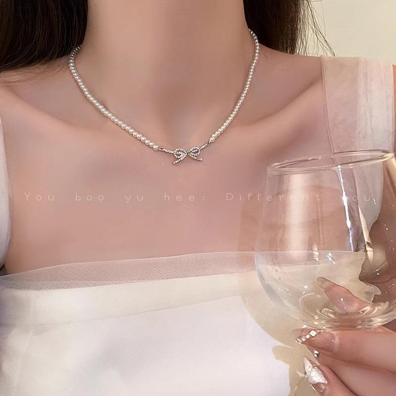 Millet beads pearl bow necklace women's niche high-end clavicle chain new temperament accessories