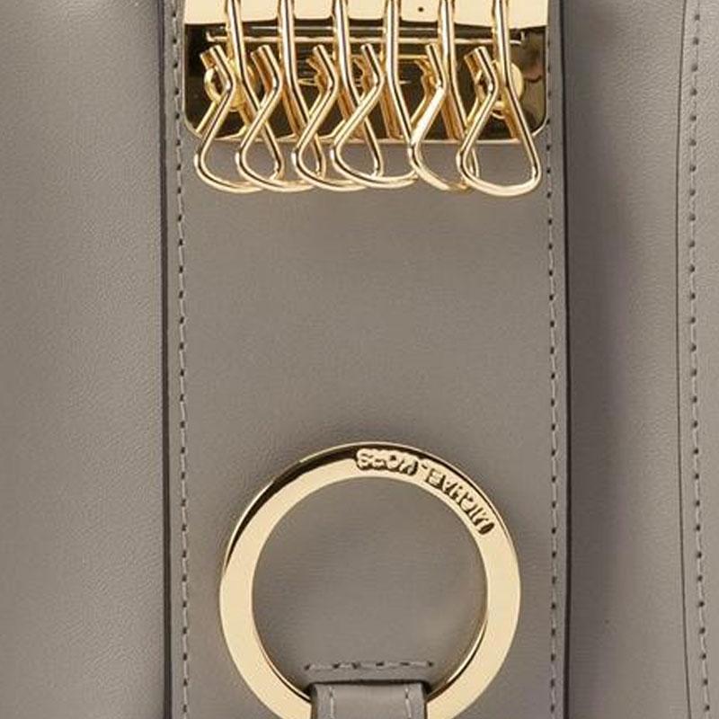 MICHAEL KORS Jet Set Travel branded lettering all over coated canvas key bag small size women's optical white