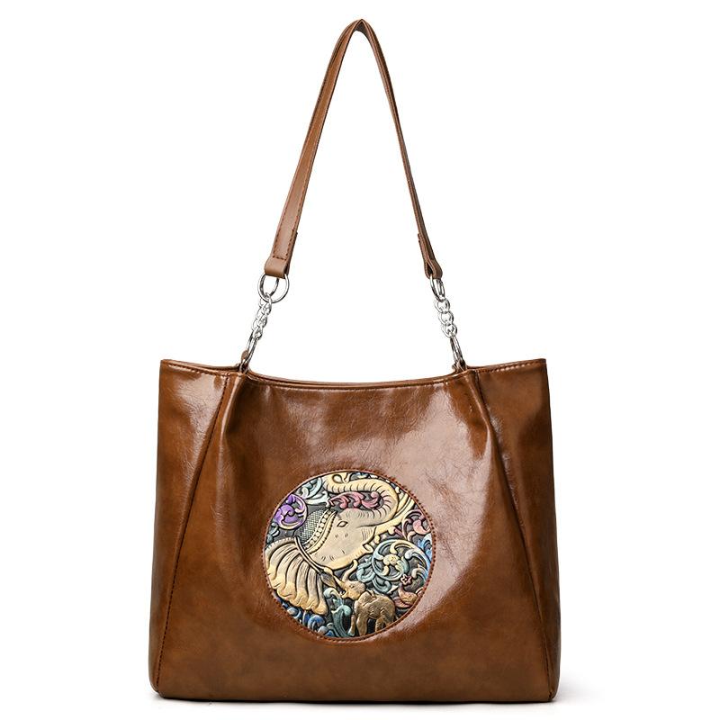 

New female auspicious elephant high-end sense large-capacity tote bag leisure travel versatile backpack temperament bag коричневый