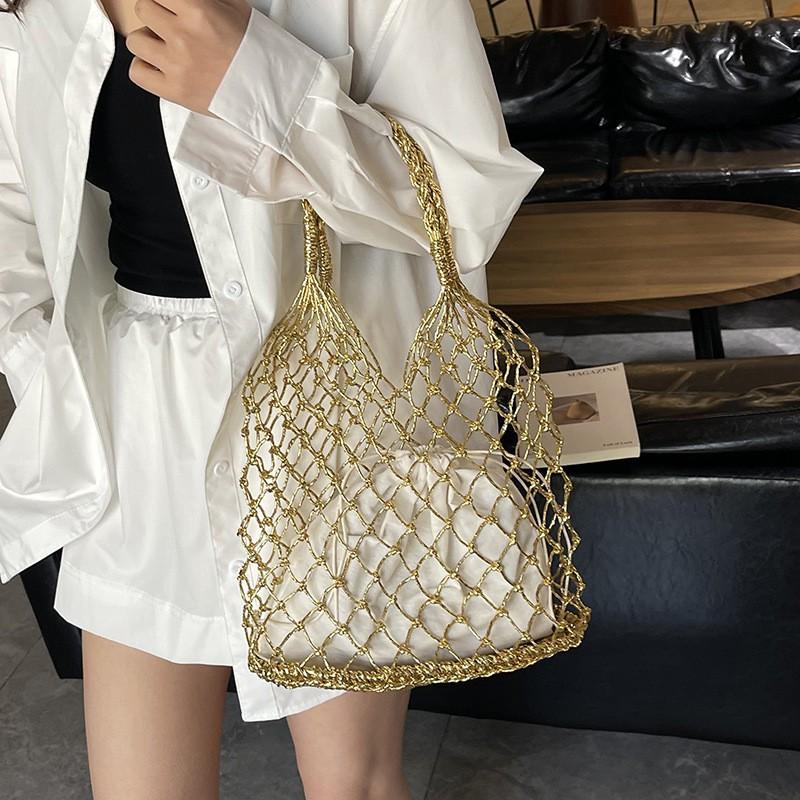 Hand-woven Bag Women 2025ins Wind Fishing Net Hollow Handbag Niche Travel Beach