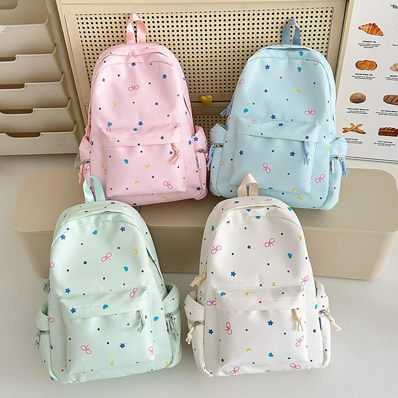 School bag female ins Japanese girl college style bow backpack Korean version Harajuku printed middle school student backpack female