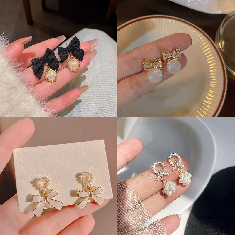 Fashion and elegance, atmospheric bow pearl earrings, women's design sense, versatile, exquisite stud earrings, sweet temperament, ear jewelry