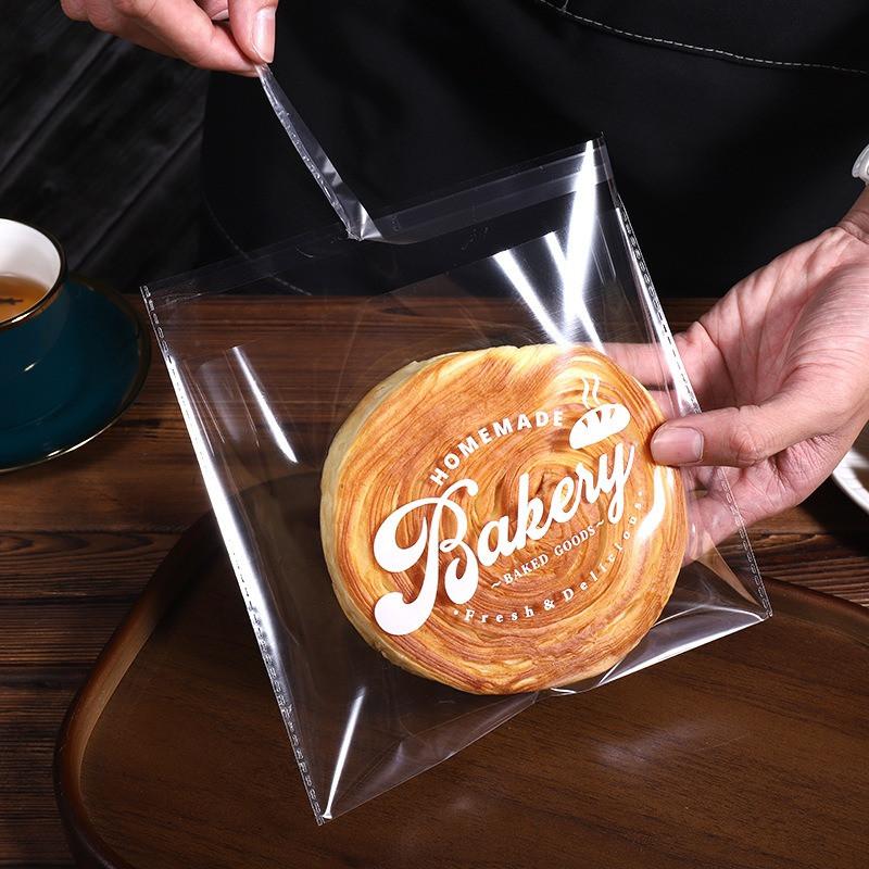 

100Pcs Clear Transparent Plastic Bags Self-adhesive Baking Bread Sliced Toast Sandwich Snack Pastry Packaging 15x18cm