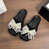 Sweet lace bow one-word female summer flat bottom cool slippers light and comfortable outer wear casual Korean version cool slippers
