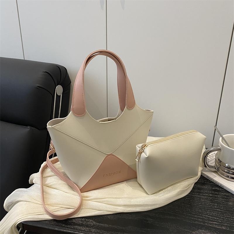 

Летняя новая модель с комбинированным дизайном, повседневная универсальная сумка-ведро для поездок на работу, портативная на плечо/через плечо, премиальная сумка для мамы и ребенка розовый