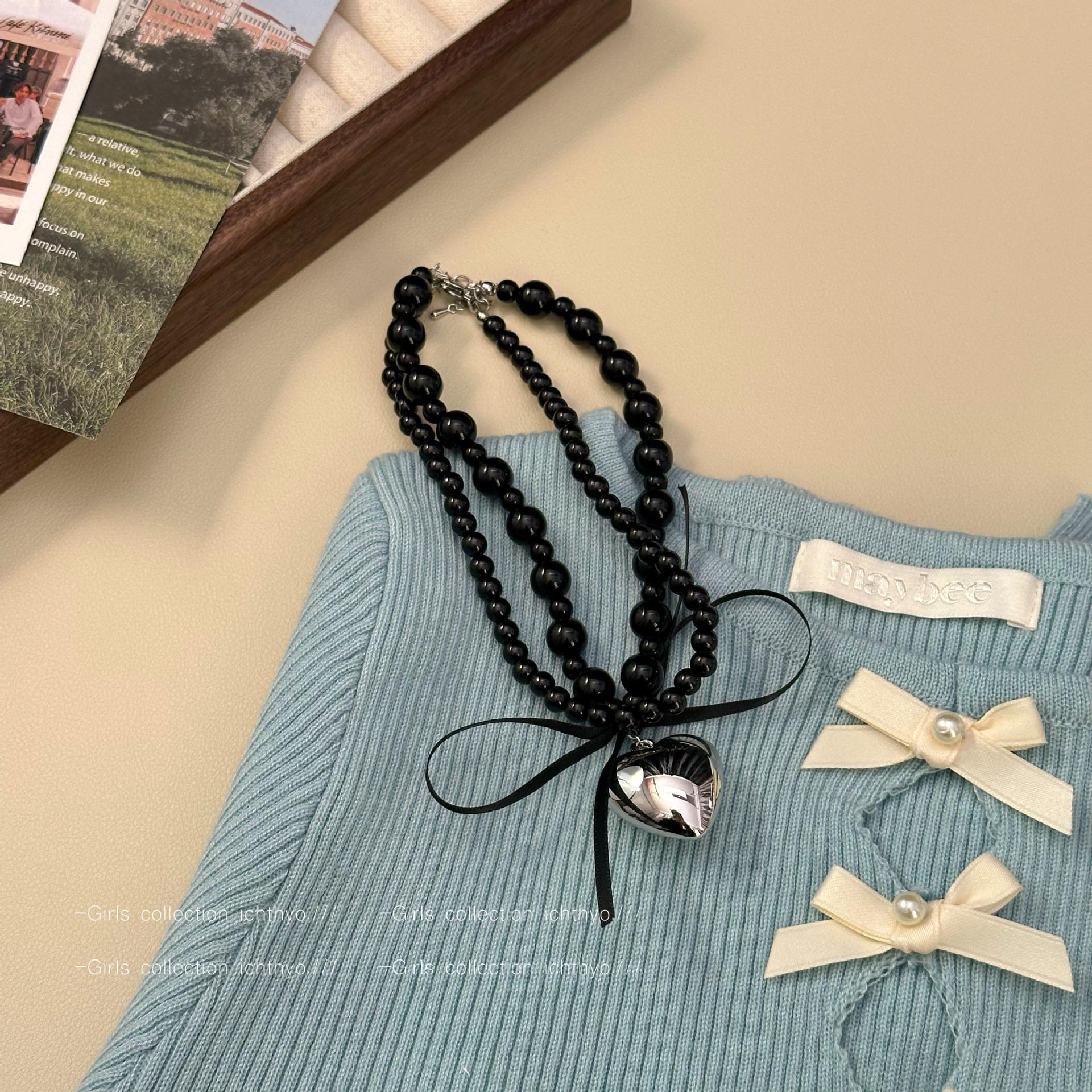 Bow ribbon love pearl necklace women s high-end collarbone chain light luxury niche sweater chain
