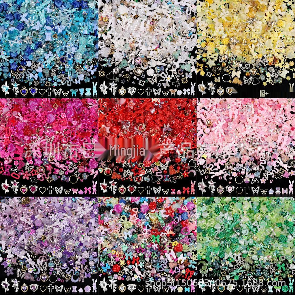 650PCS Mixed Nail Art Kit: Bows, Chrome Hearts, Pearls, Rivets, and Fairy Style Colors.