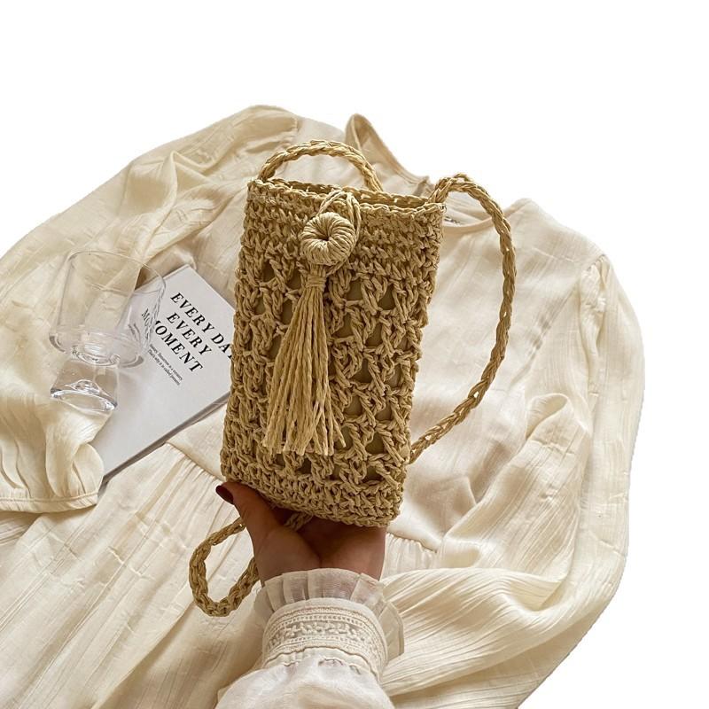 A Stylish Single-shoulder Crossbody Bag Made of Hollow-woven Fabric, Perfect for Carrying Your Phone.
