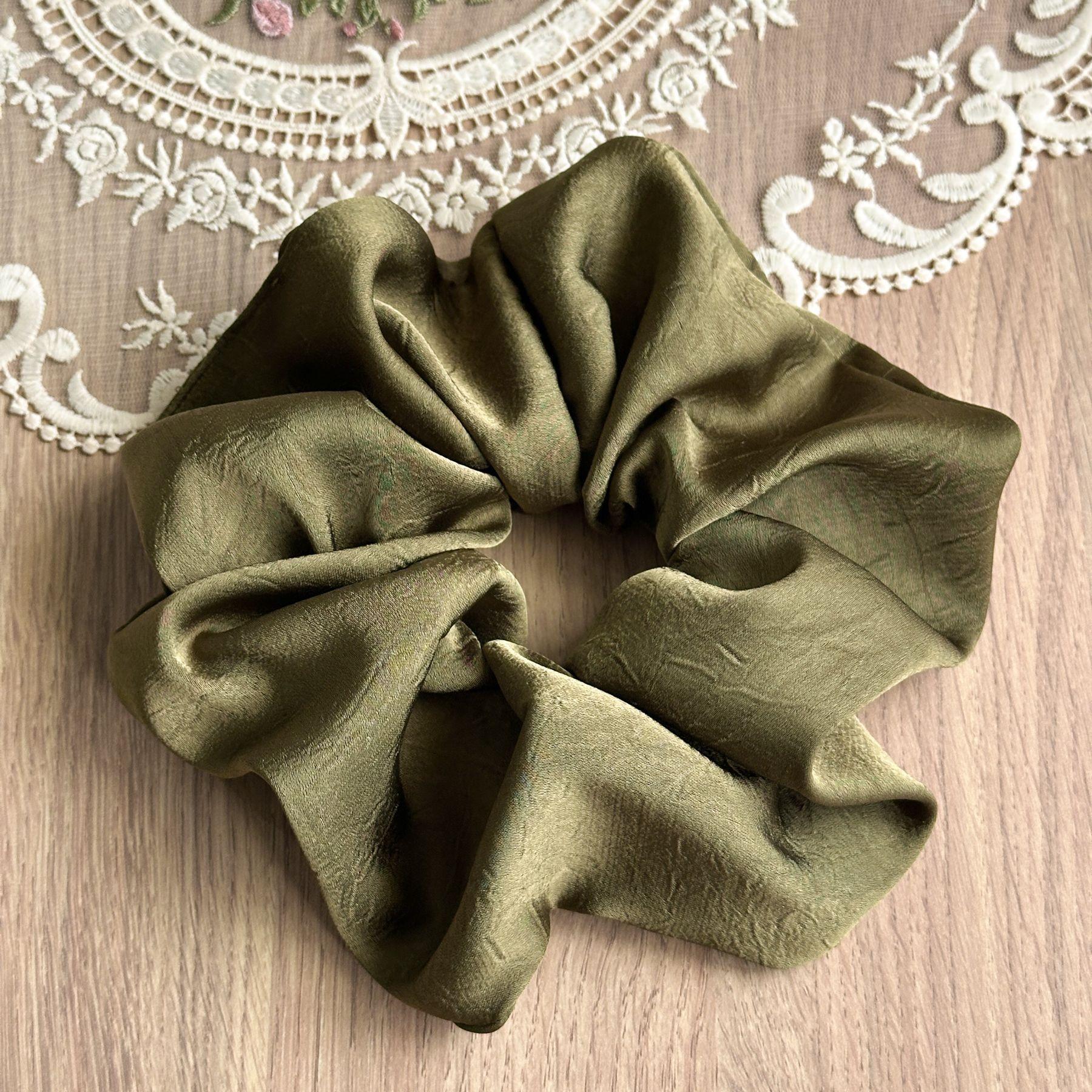 

Understated Elegant Scrunchies In Rich Earthy Tones With A Subtle Sheen For A Minimalist And Polished Professional Look Textured Green