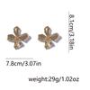 Exaggerated three-dimensional flower earrings for women, a light luxury and high-end metallic style, fashionable and individual earrings for women