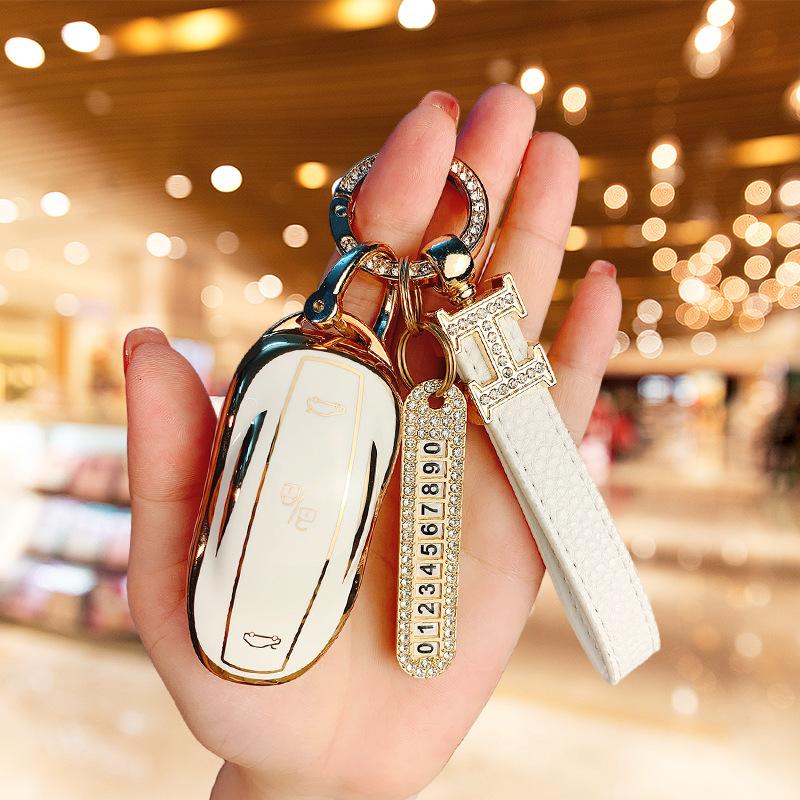 Suitable for Tesla Model 3 key cover ModelY/S/X high-end protective case, car supplies, bag buckle, men and women