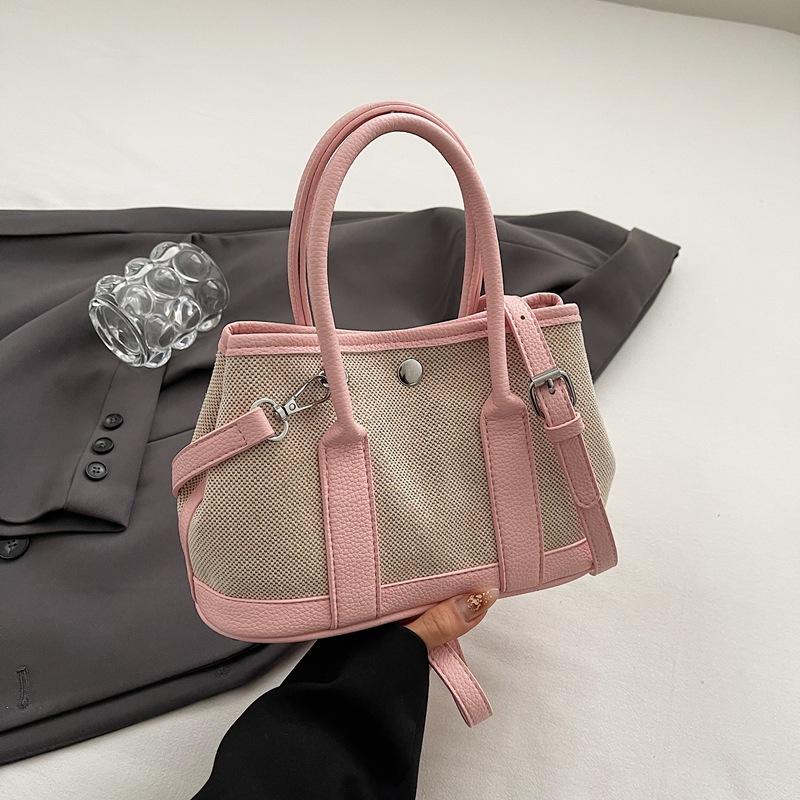 Summer new fashion contrast large-capacity hand-held bucket bag women's simple casual commuter shoulder body bag