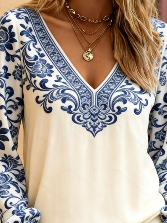 Retro ethnic style V-neck women's long-sleeved top with lantern sleeves and totem prints, Bohemian style lantern sleeve design.