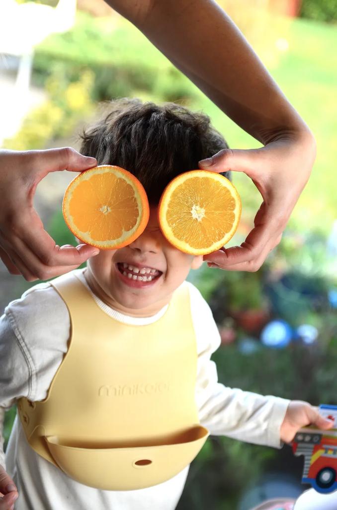 Silicone Bib for Children with Pocket for Dishes Yellow MinikOiOi 1 Pc.