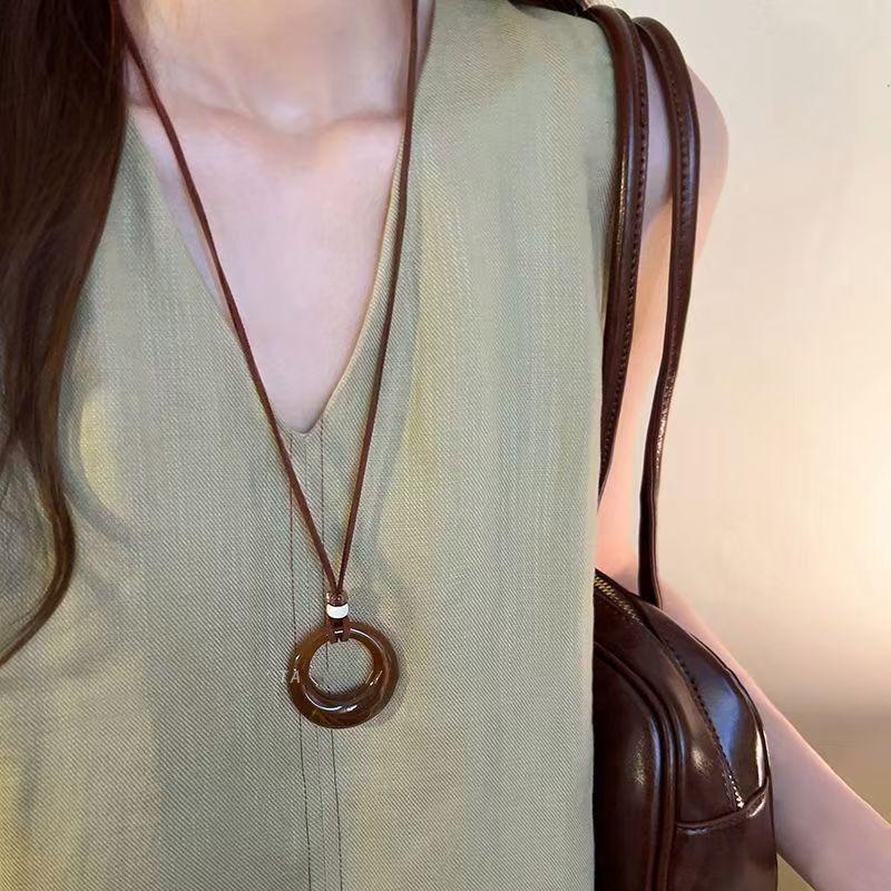 Vintage geometric ring pendant necklace women's fashion versatile long sweater chain high-end temperament accessories