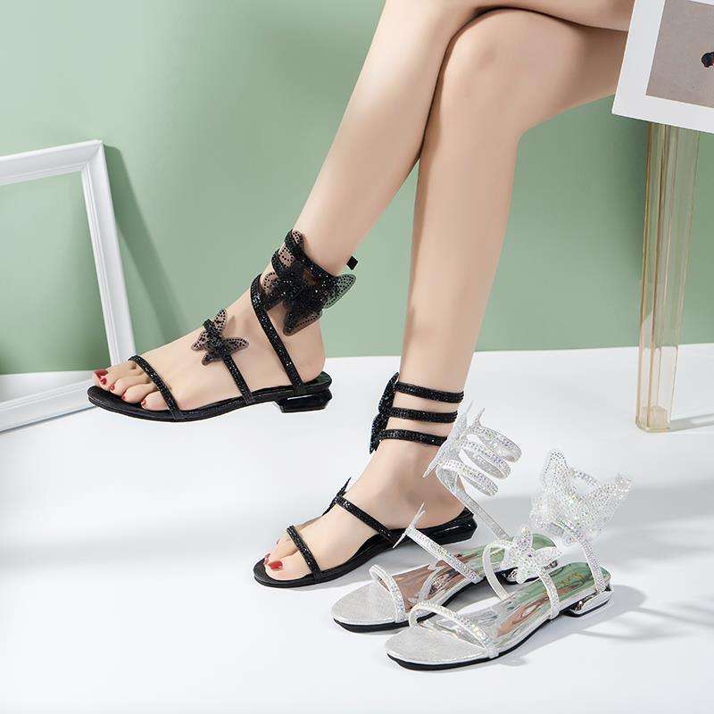 Rhinestone Serpentine Winding Sandals Female Flat Bottom One Word with Low Heel Explosion 2025 New Fairy Wind Roman Crystal Shoes