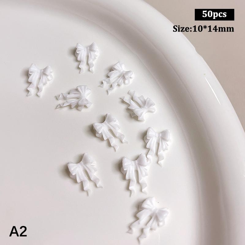 50 vnt. Ilgi banguoti lankeliai Nagų dailės priedai 2 dydžiai Spalvingi kaspino lankeliai 3D dervos nagų pakabukai Japoniškas nagų dekoras Mielos detalės Kaspinas