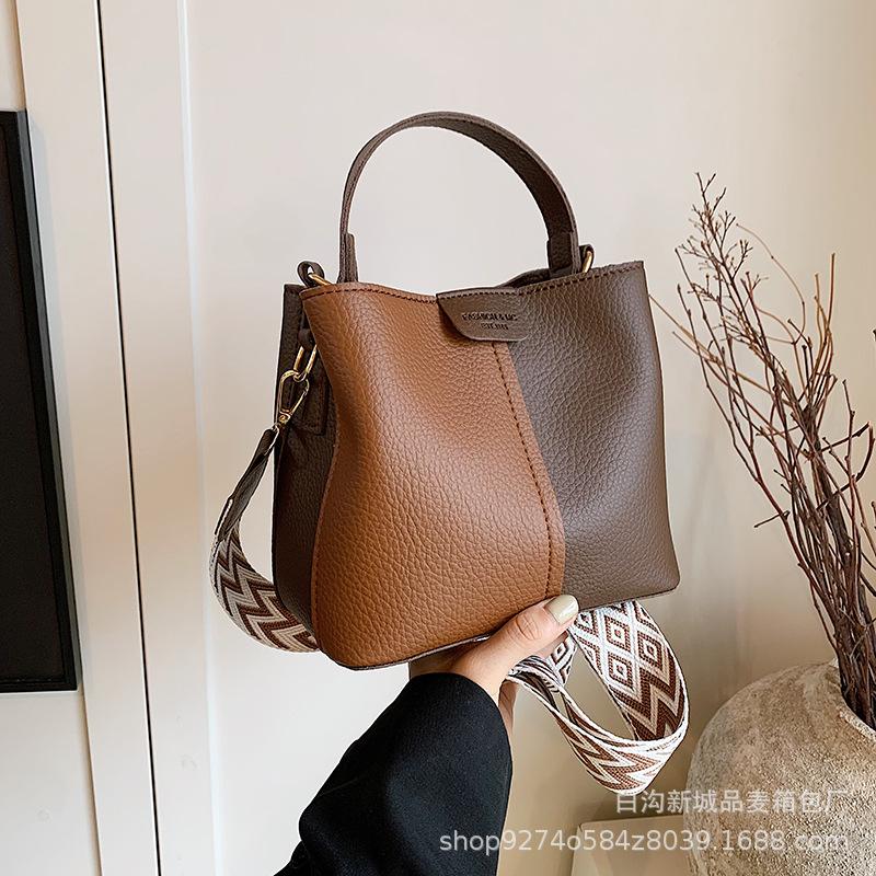 

Manufacturer contrasting color portable small bag women s 2025 new temperament versatile shoulder bag foreign style messenger bucket bag