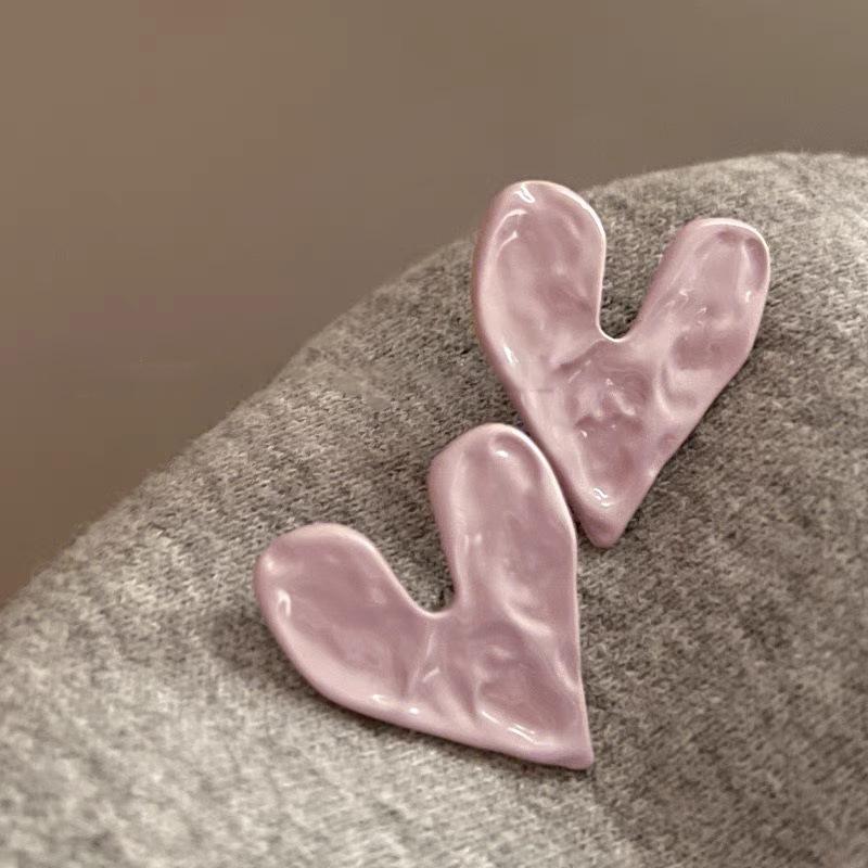 Boucles d'oreilles bohèmes roses à fleurs de perles de rocaille et pompons de perles