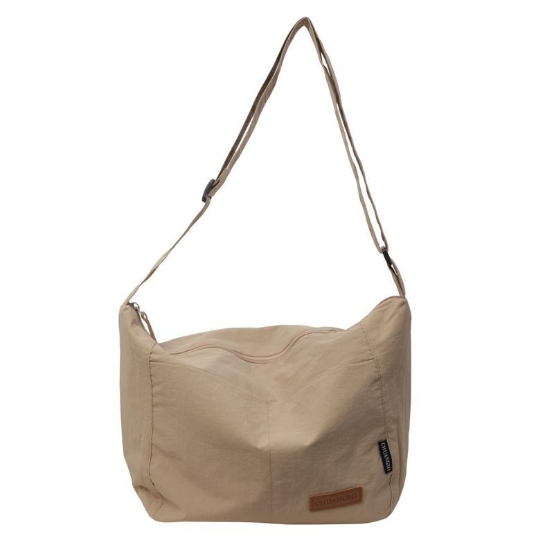 New simple and fashionable large-capacity Japanese solid color shoulder bag versatile casual trend lazy wind messenger bag